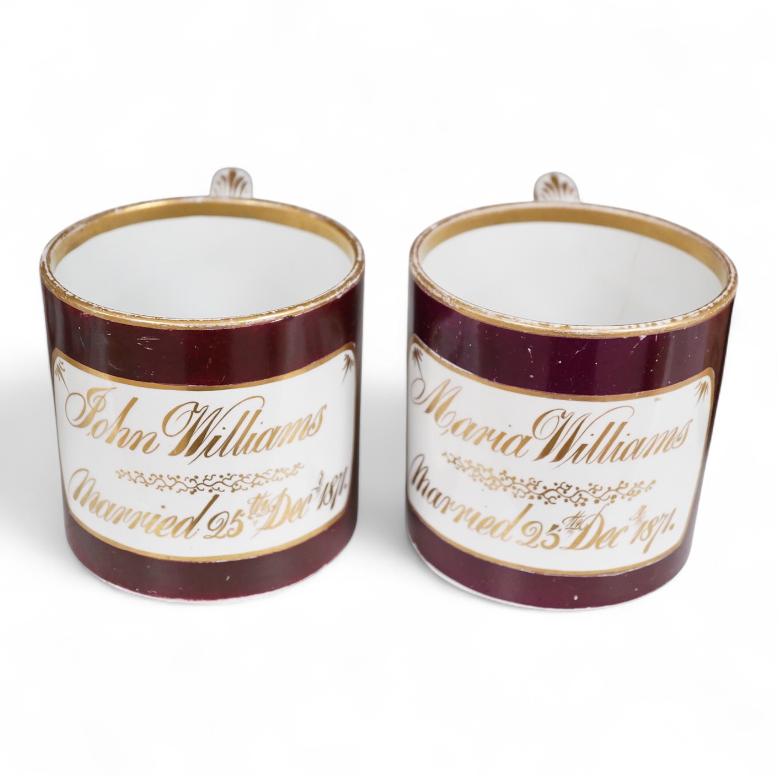 A pair of 1871 porcelain commemorative marriage mugs